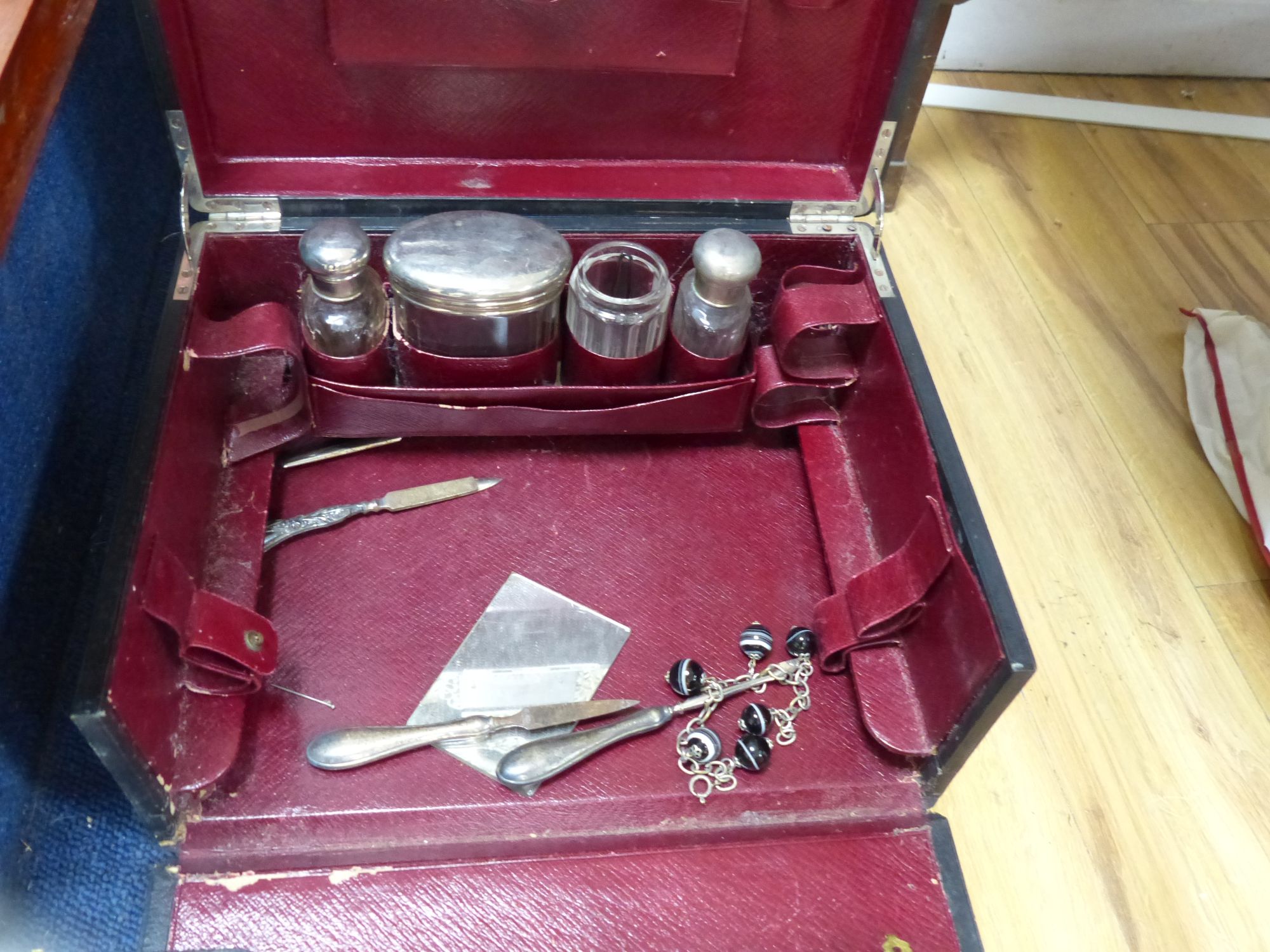 Eight assorted cased sets of silver plated cutlery including dessert eaters and a plated part toilet set.